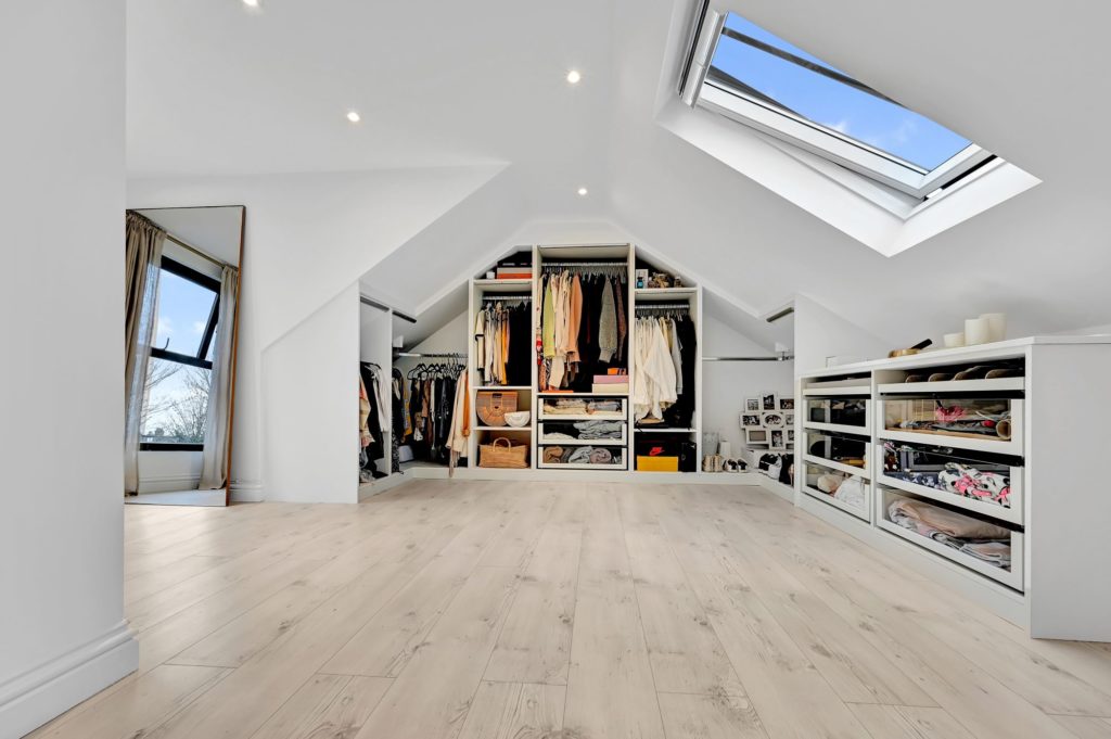 Stunning Dormer Loft Conversion featuring open built-in storage