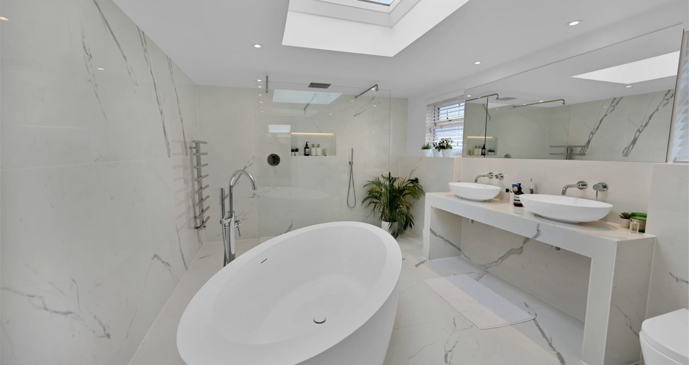 beautiful bathroom in an L shaped dormer loft conversion at a property in Thames Ditton Surrey, KT10